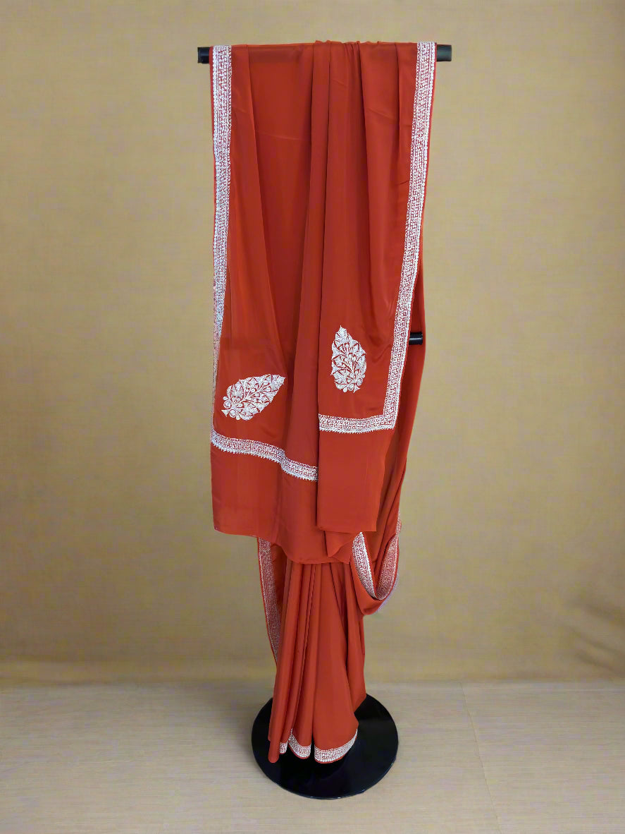 Pamposh Rust Orange Crepe Saree with Kashmiri Tilla Embroidery